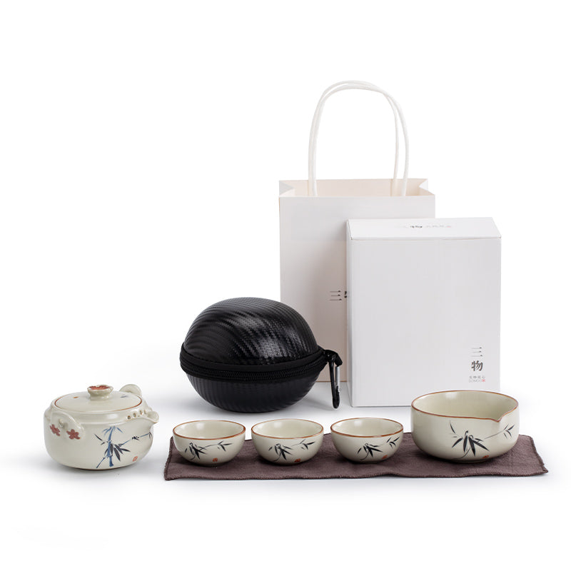 Zen portable Ruyao travel tea set with teapot, pitcher, cups, and travel case.