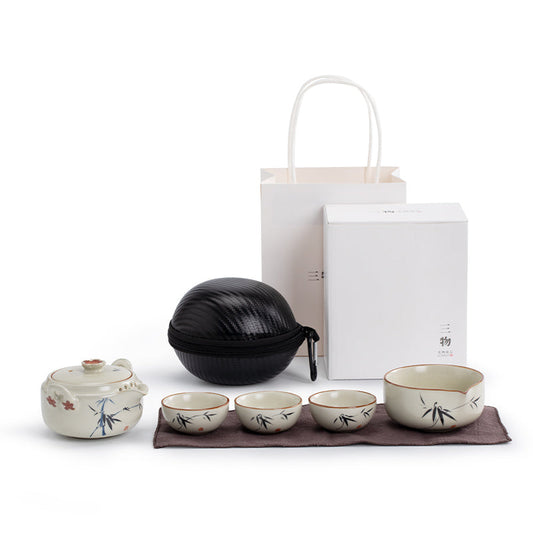 Zen portable Ruyao travel tea set with teapot, pitcher, cups, and travel case.