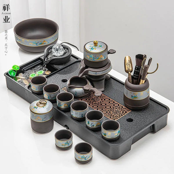A complete set of ceramic teapots and cups for lazy people in the living room with fully automatic water flow tea trays